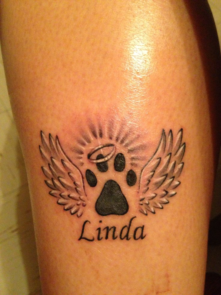 Linda - Dog Paw Print With Angel Wings Tattoo Design For Arm