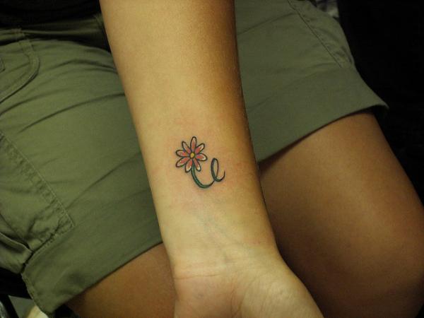 Little Daisy Flower Tattoo On Left Wrist
