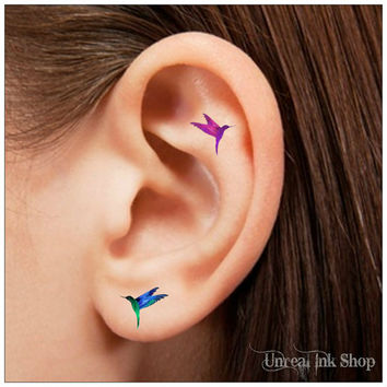 Little Two Hummingbird Tattoo On Ear