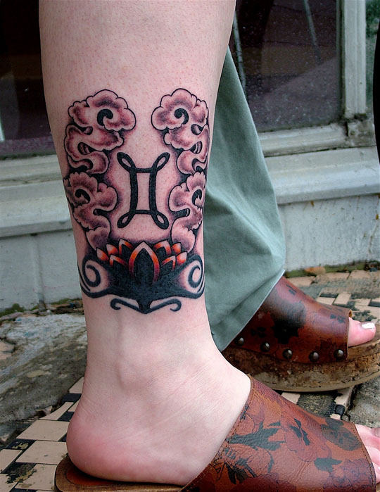 Lotus Flower And Gemini Tattoo On Leg