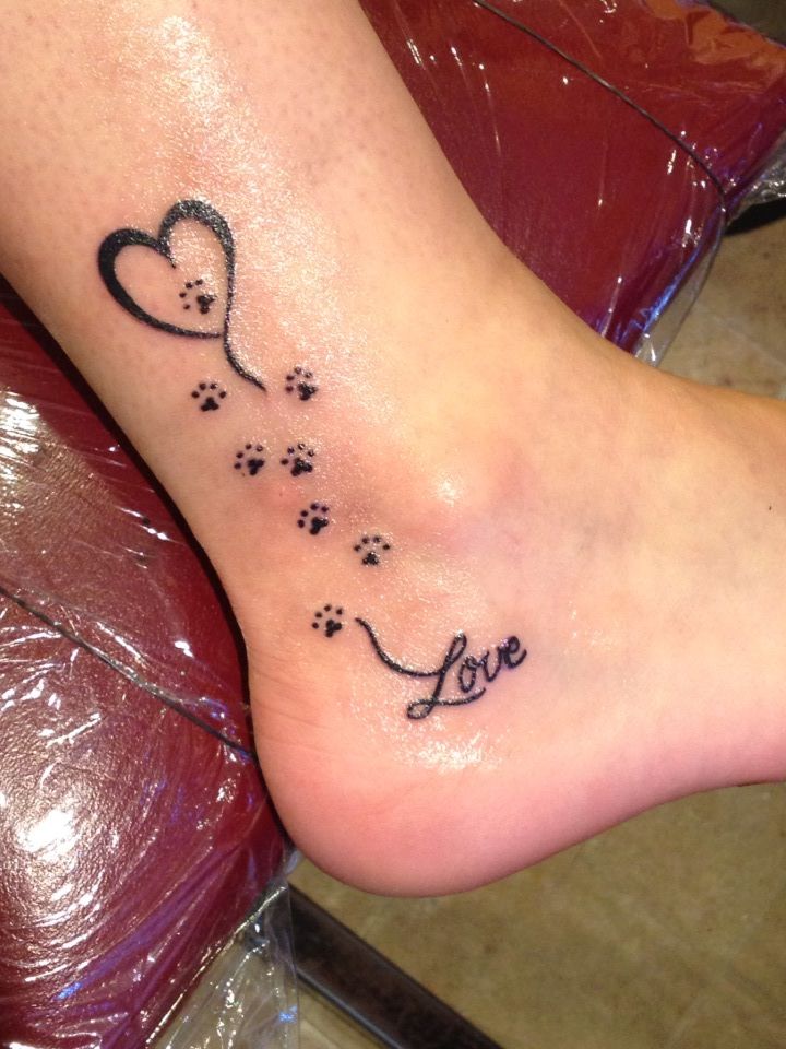 Love - Black Dog Paw Prints Tattoo On Leg