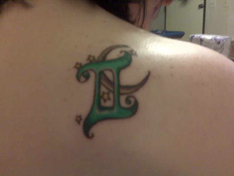Moon And Green Gemini Tattoo On Right Back Shoulder