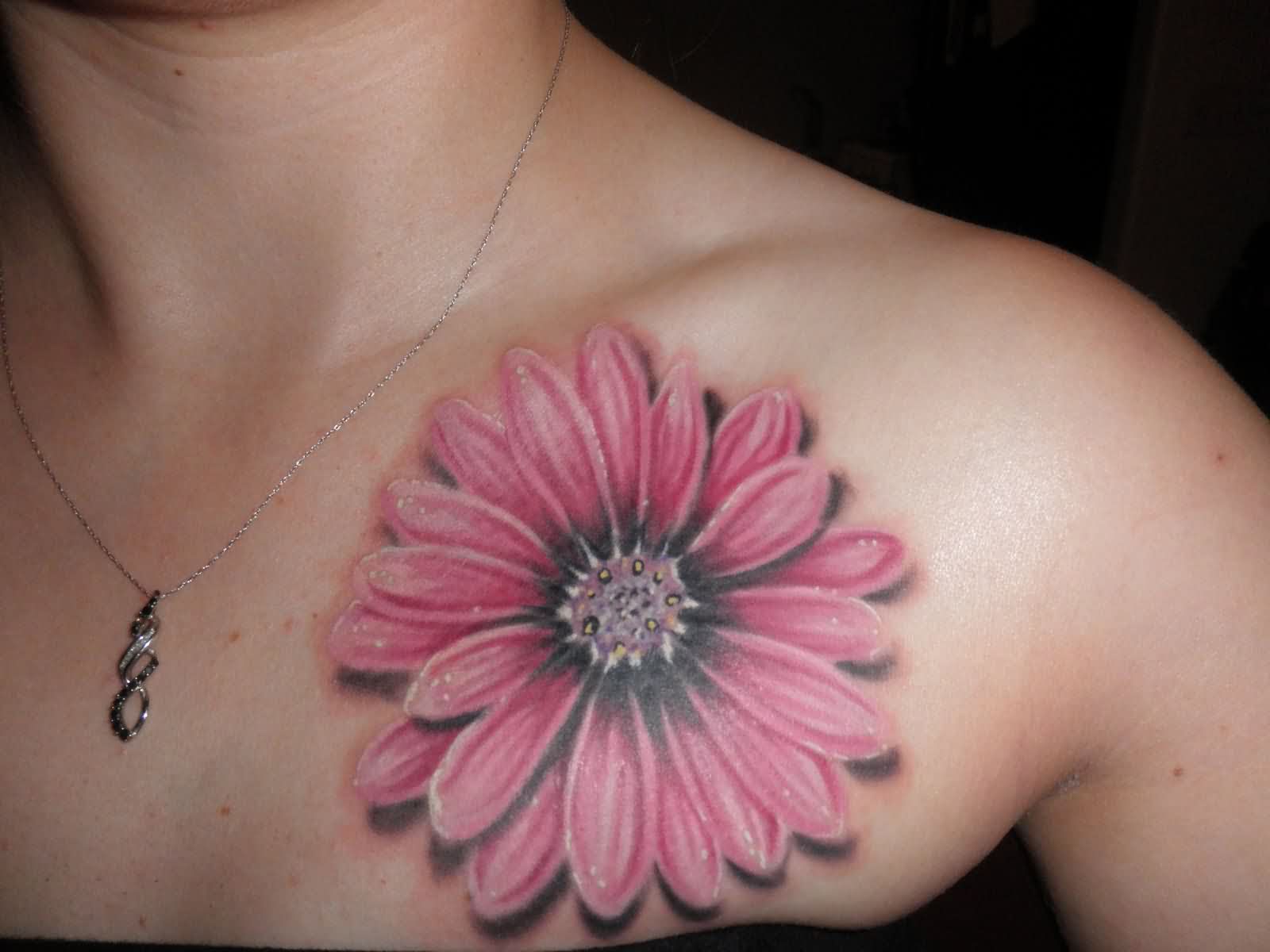 Pink Daisy Flower Tattoo On Left Front Shoulder
