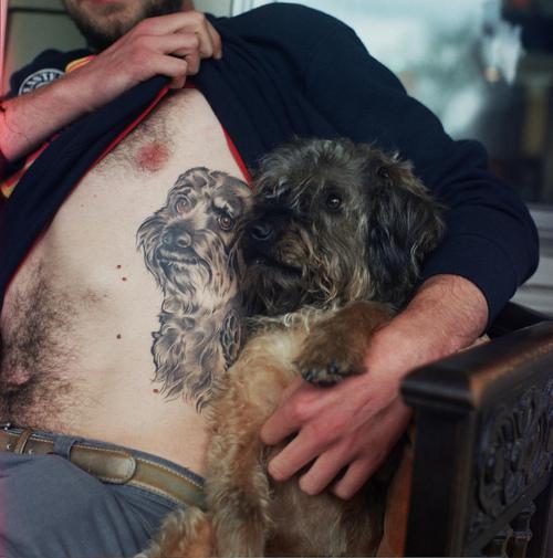 Realistic Dog Tattoo On Man Side Rib