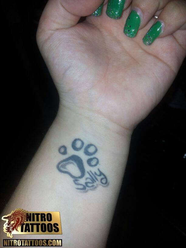 Sally - Dog Paw Print Tattoo On Girl Wrist