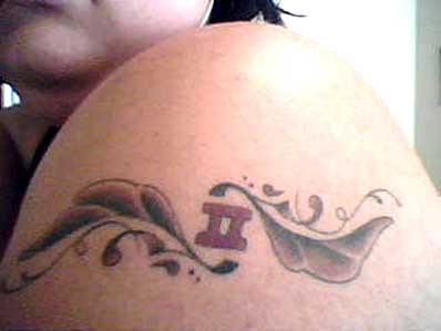 Small Gemini Zodiac Tattoo On Girl Left Shoulder