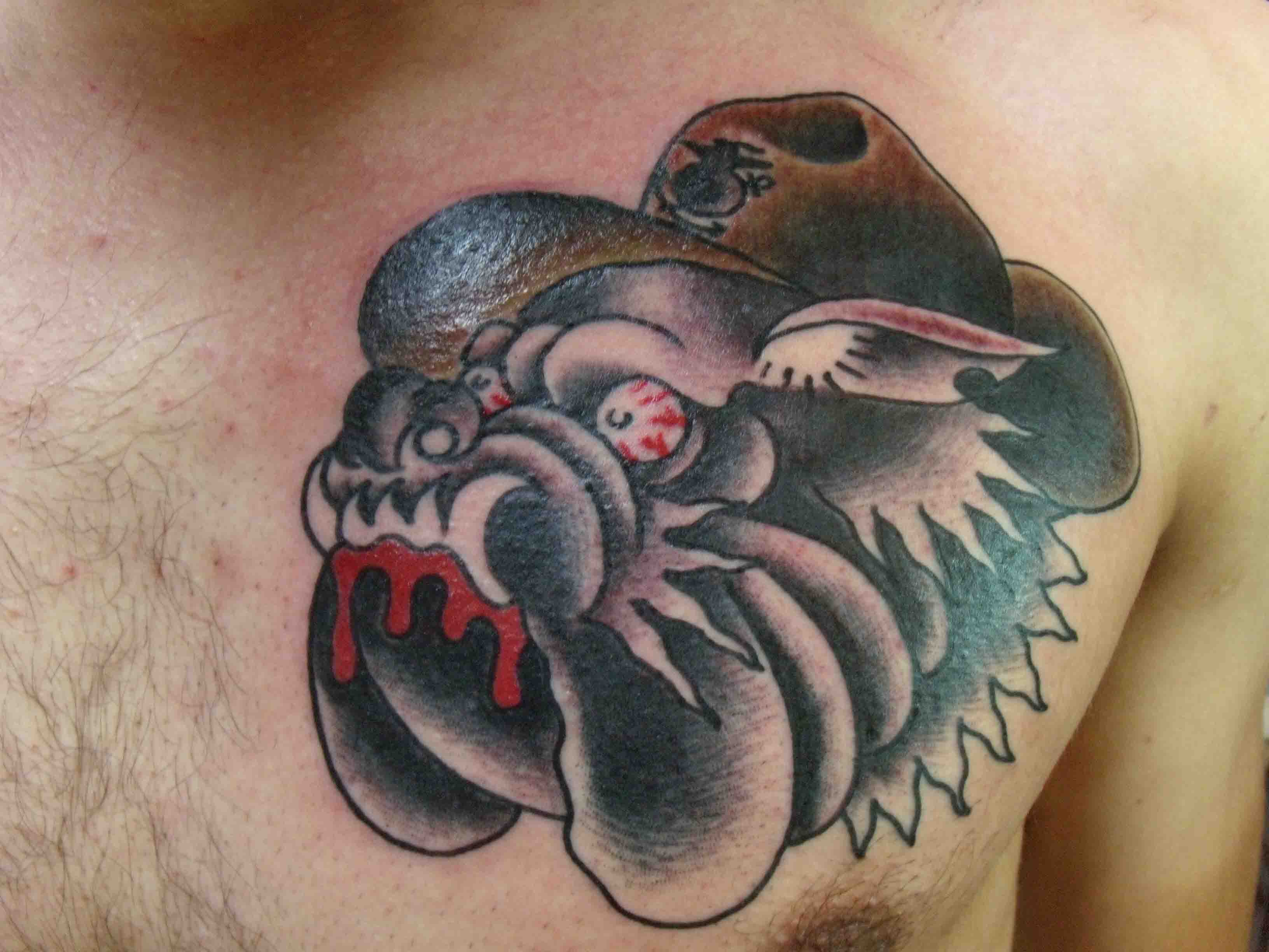 Traditional Bulldog Face Tattoo On Man Chest
