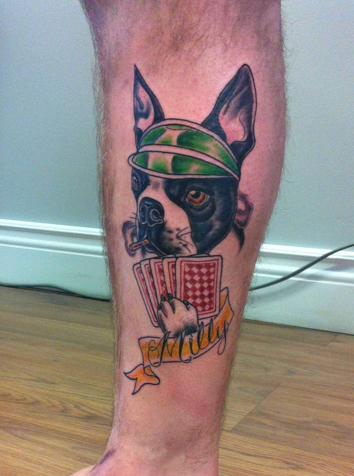 Traditional Dog With Playing Cards And Banner Tattoo On Leg