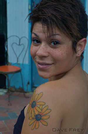 Two Yellow Daisy Flowers Tattoo On Girl Left Shoulder