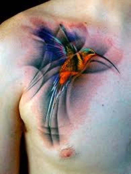 Unique Colorful Flying Hummingbird Tattoo On Right front Shoulder