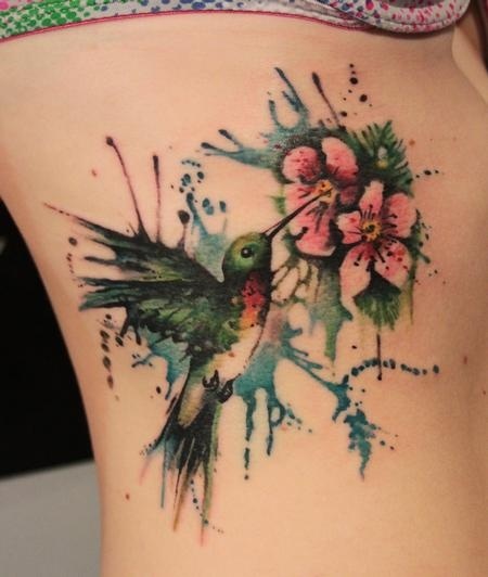 Watercolor Flying Hummingbird With Flower Tattoo Design For Side Rib