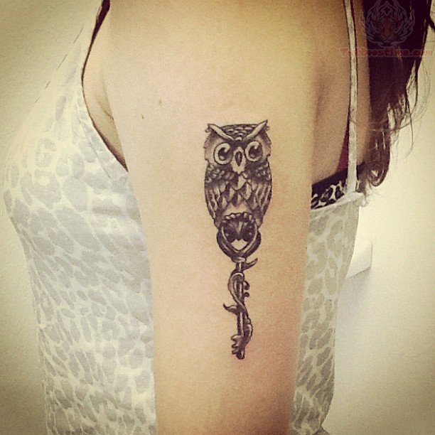 black Ink Owl With Key Tattoo On Girl Left Half Sleeve