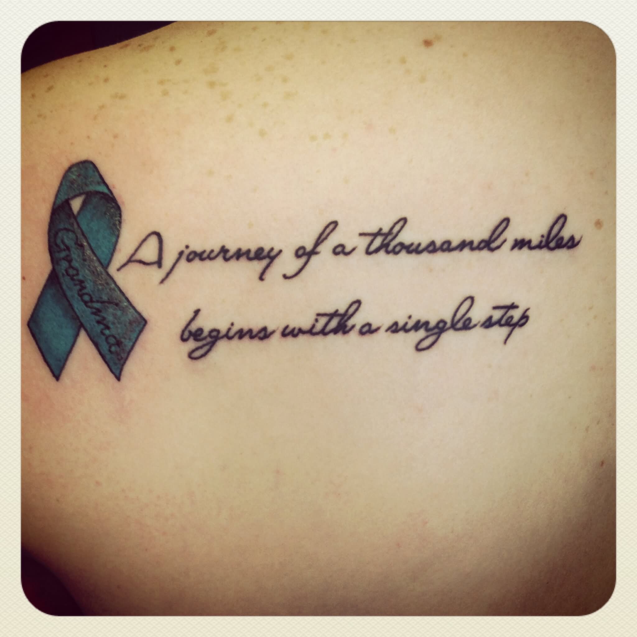 3D Cancer Ribbon With Words Tattoo Design For Upper Back