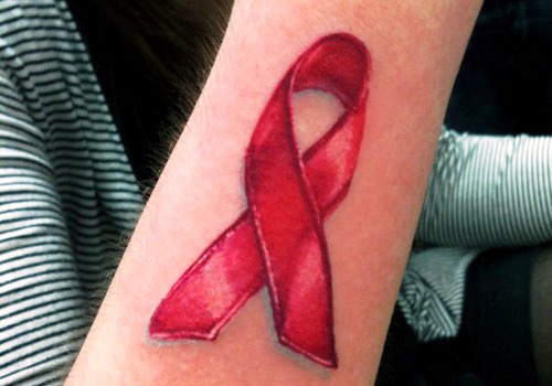 3D Red Cancer Ribbon Tattoo Design For Forearm
