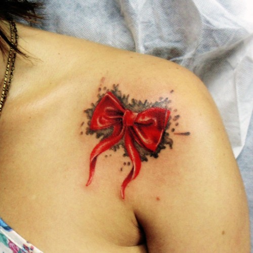 3D Red Ribbon Bow Tattoo On Left Front Shoulder