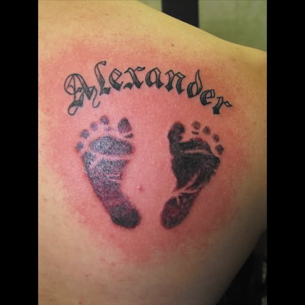 Alexander - Black Footprints Tattoo On Right Back Shoulder