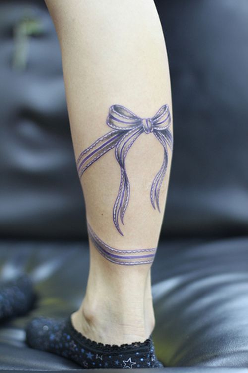 Amazing Lace Ribbon Bow Tattoo On Leg