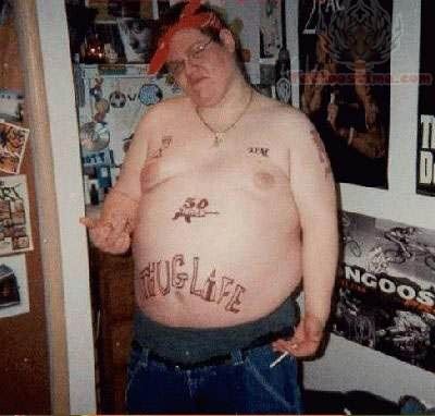 Amazing Thug Life Lettering Tattoo On Man Stomach