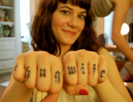 Amazing Thug Wife Lettering Tattoo On Girl Both Hand Fingers