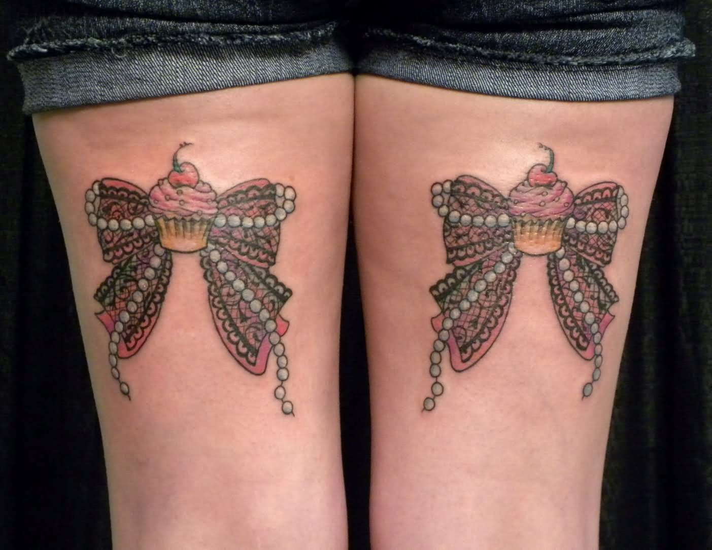 Amazing Two Ribbon Bow Tattoo On Both Back Leg