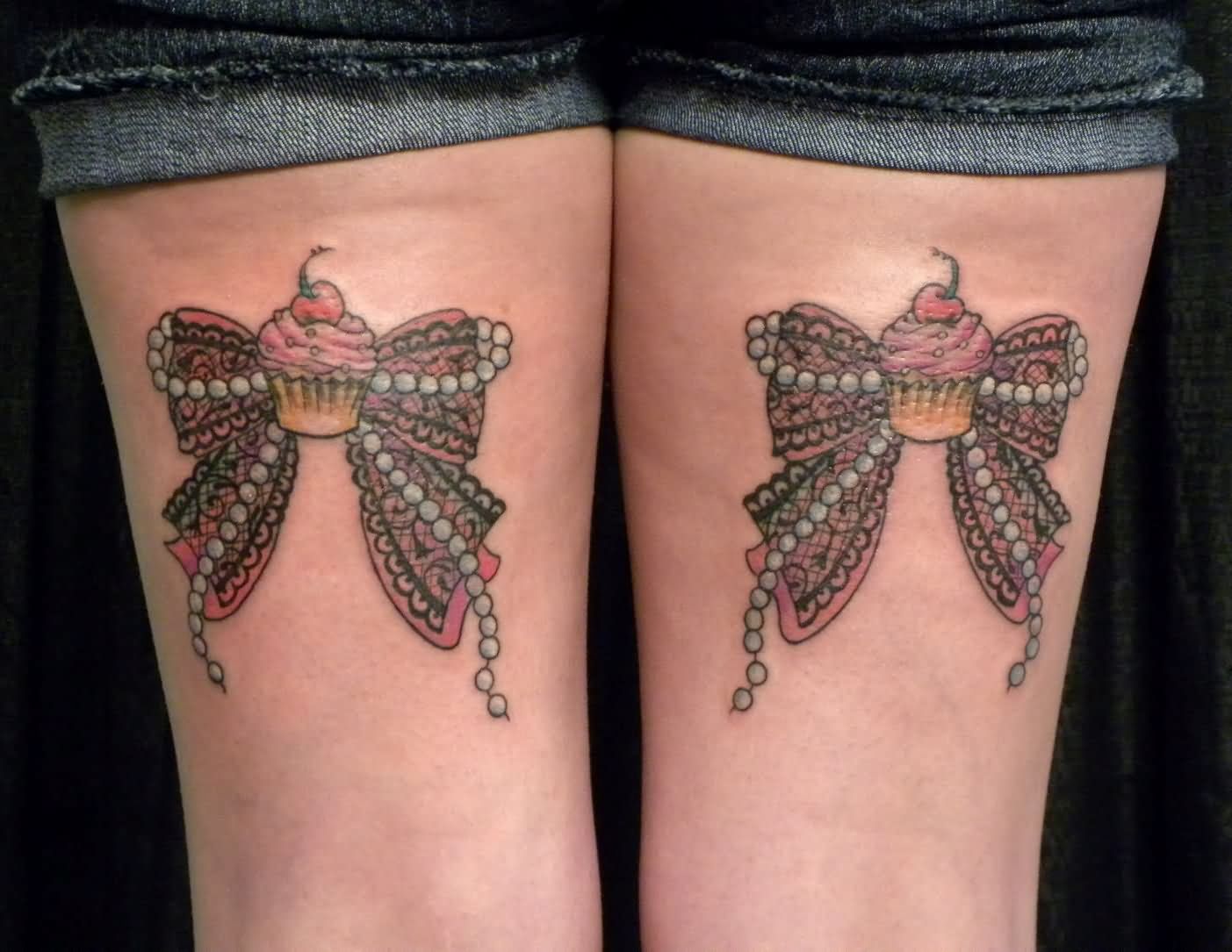 Amazing Two Ribbon Bow Tattoo On Both Back Thigh