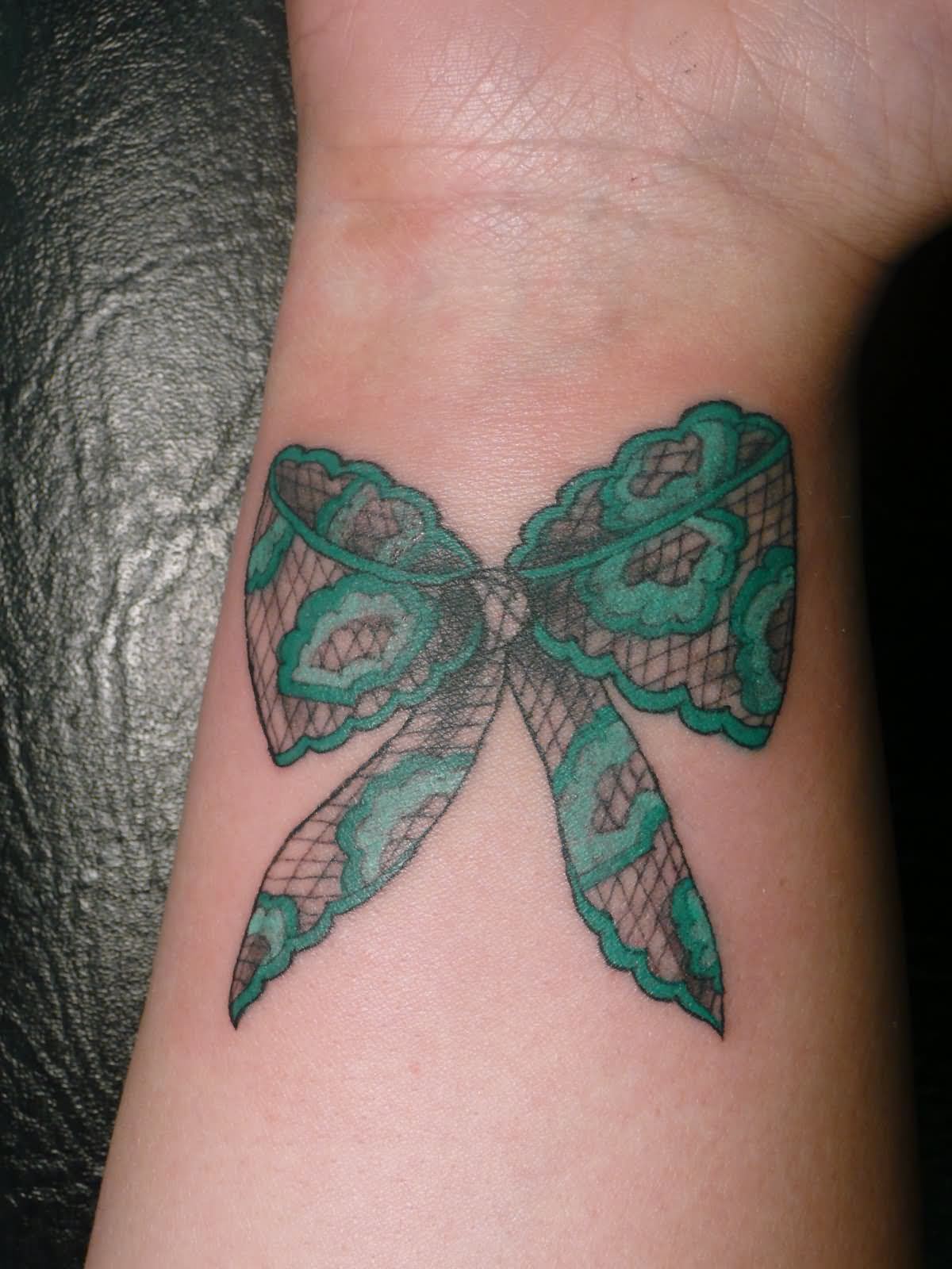 Awesome Ribbon Bow Tattoo Design For Wrist