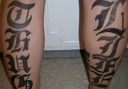 Awesome Thug Life Lettering Tattoo On Man Both Leg