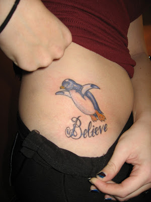 Believe Penguin Tattoo On Side Rib