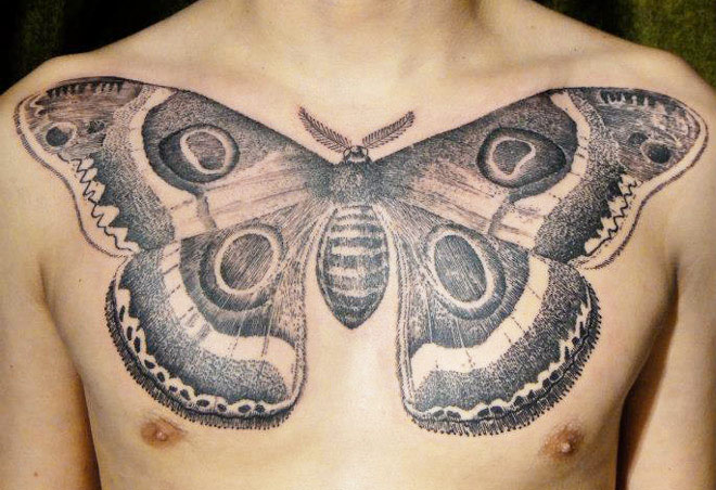 Black And Grey Butterfly Tattoo On Man Chest