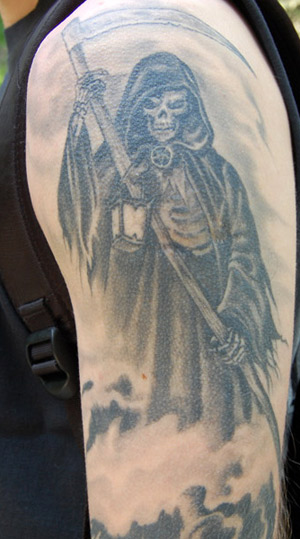 Black And Grey Death Grim Reaper Tattoo On Half Sleeve