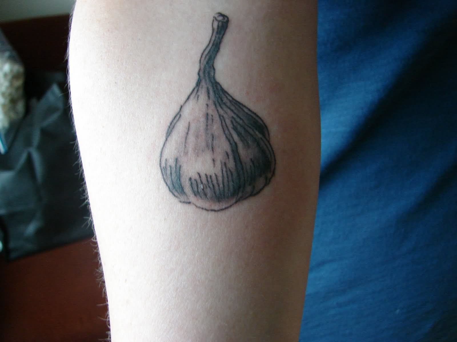 Black And Grey Garlic Tattoo Design