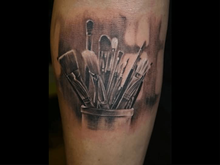 Black And Grey Paintbrush And Pencil Tattoo Design