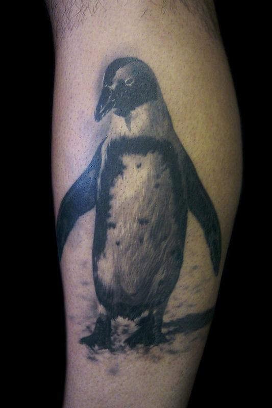 Black And White Penguin Tattoo On Leg