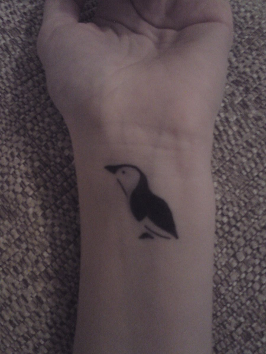 Black And White Simple Penguin Tattoo On Wrist