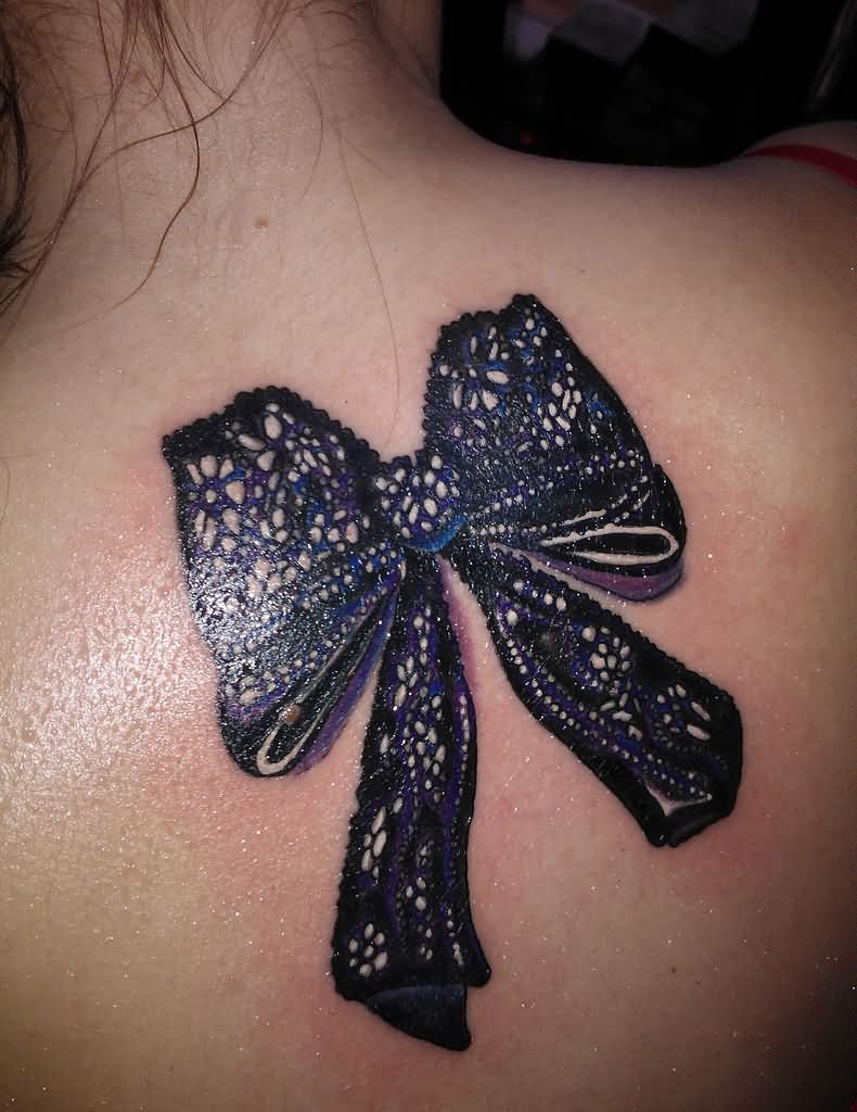 Black Ink 3D Lace Ribbon Bow Tattoo On Upper Back
