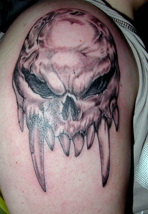 Black Ink Death Skull Tattoo On Shoulder