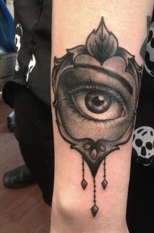 Black Ink Eye In Frame Tattoo On Forearm