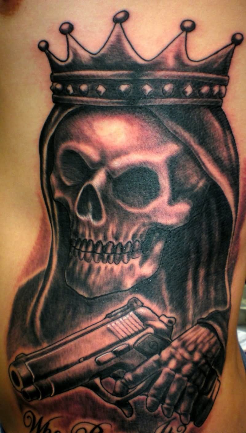 Black Ink Gun In Death Skeleton Hand Tattoo Design For Side Rib