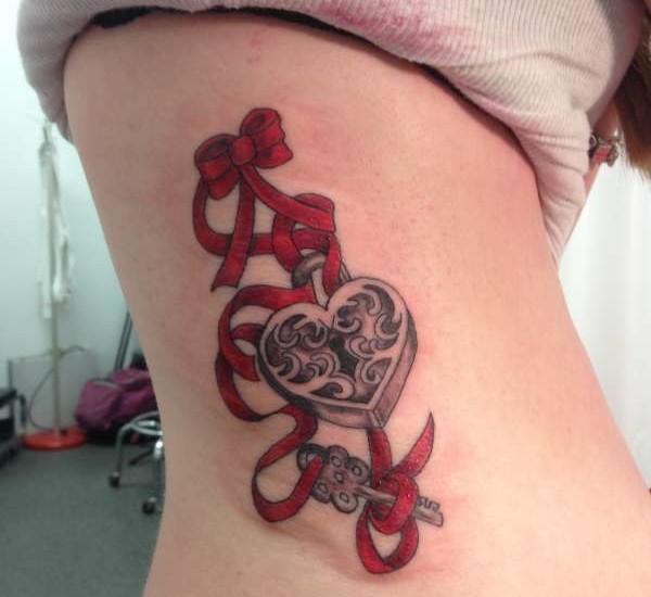 Black Ink Heart Lock With Key And Ribbon Tattoo On Side Rib