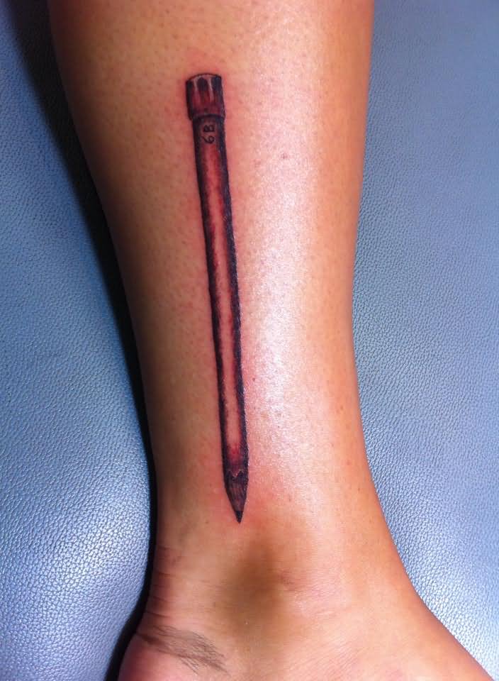 Black Ink Pencil Tattoo On Leg