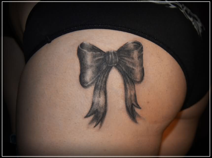 Black Ink Ribbon Bow Tattoo Design For Side Thigh