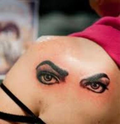 Black Ink Two Eye Tattoo On Left Back Shoulder