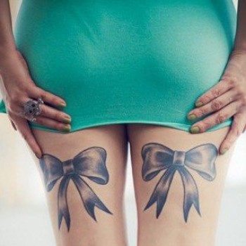 Black Ink Two Ribbon Bow Tattoo On Girl Both Back Leg