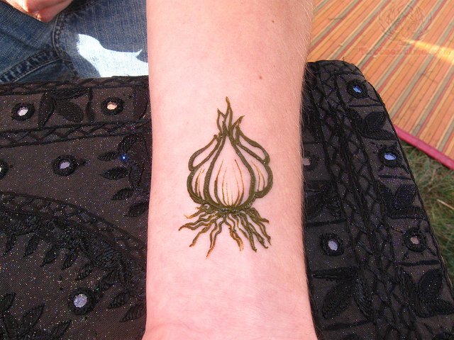 Black Outline Garlic Tattoo Design For Forearm