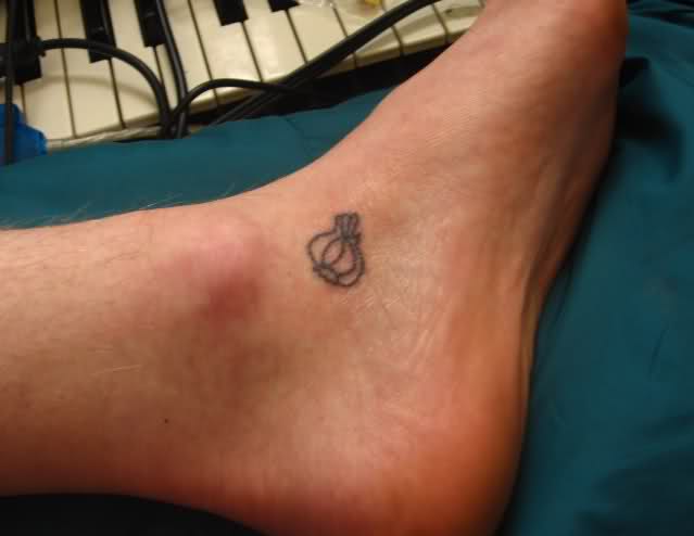 Black Outline Garlic Tattoo On Ankle