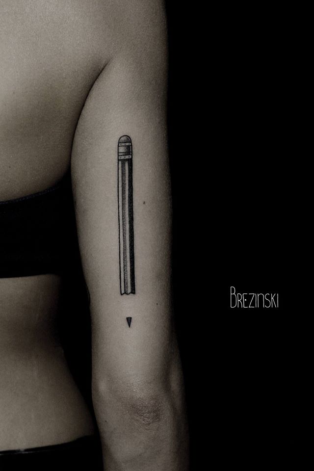 Black Pencil Tattoo On Right Half Sleeve