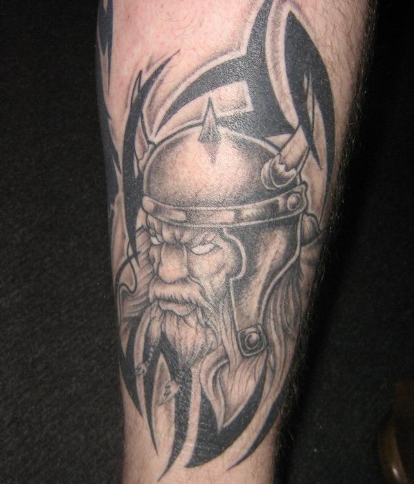 Black Tribal And Viking Tattoo On Leg