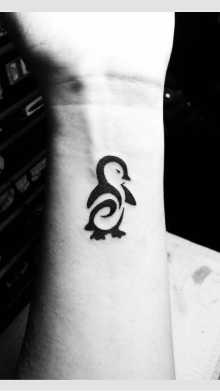 Black Tribal Penguin Tattoo On Wrist