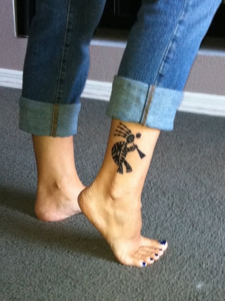 Black Turtle Kokopelli Tattoo On Girl Leg