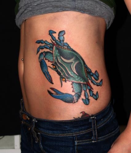 Blue Ink Crab Tattoo On Girl Left Rib Side